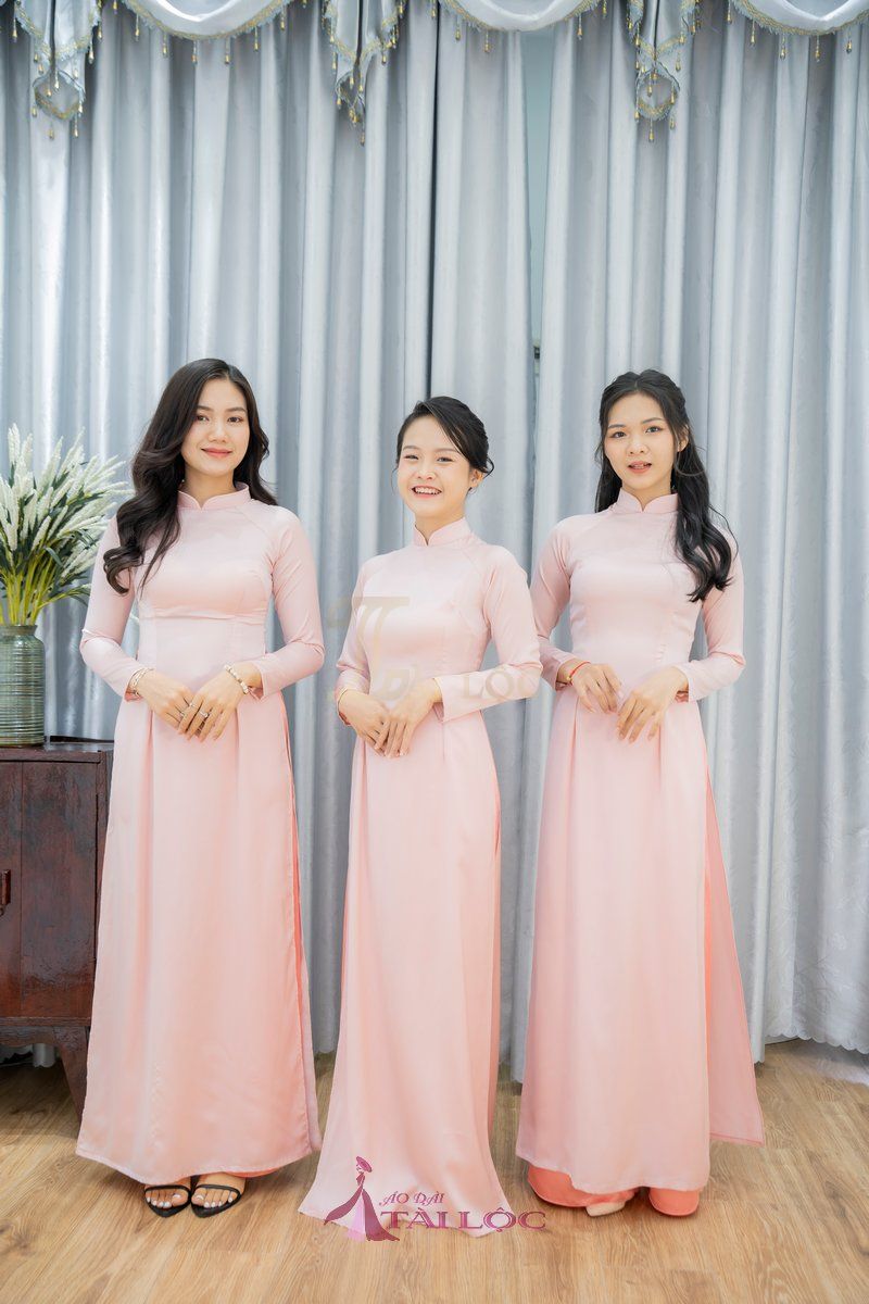 Áo dài bưng quả màu hồng cho nữ