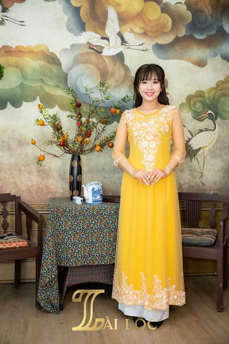 Áo dài bà sui màu vàng đồng sang trọng